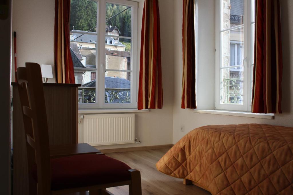 Residence Maison Blanche Plombières-les-Bains Rom bilde